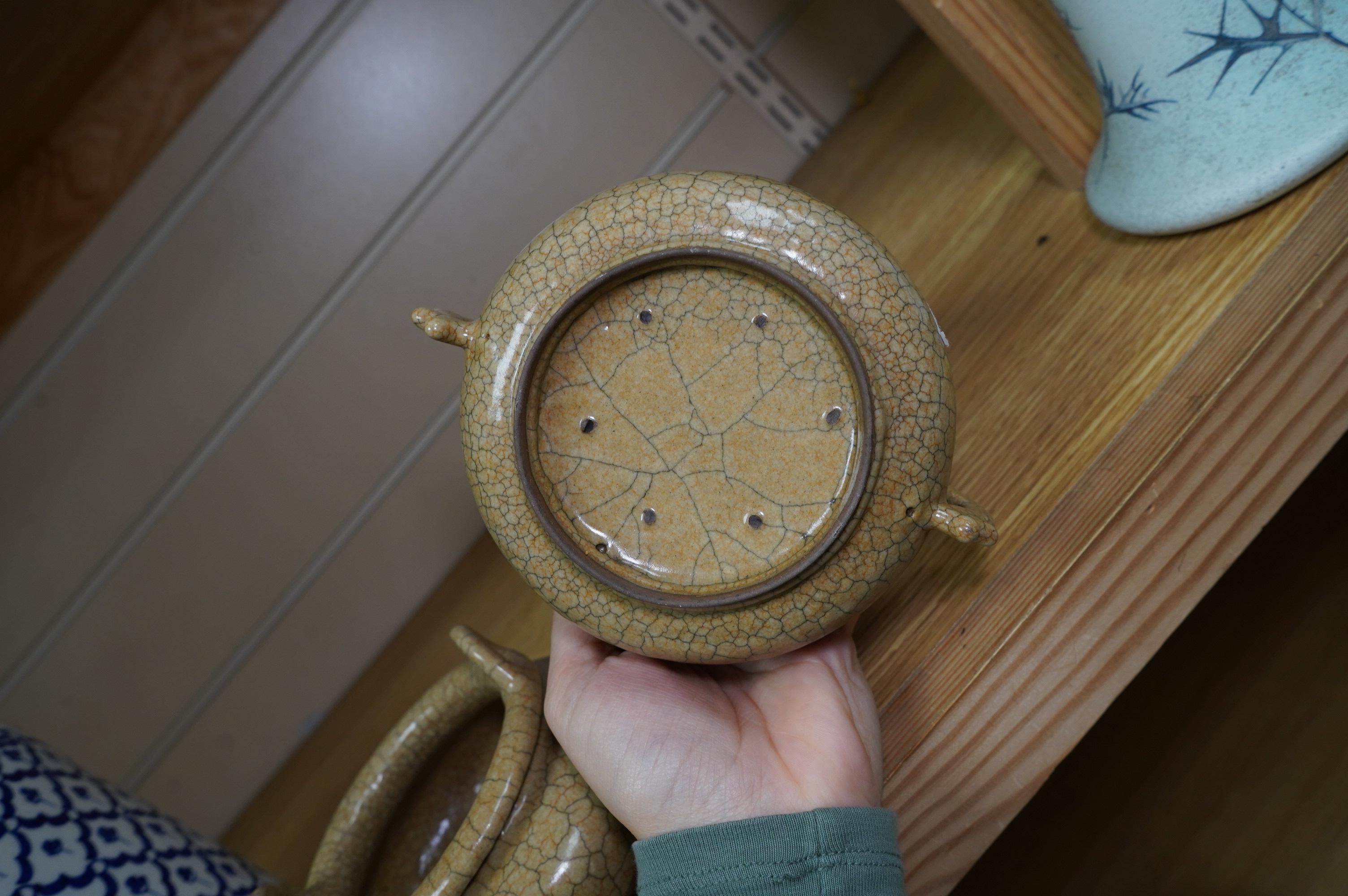 Two buff coloured crackle glazed censers including a tripod example, largest 17cm wide. Condition - good